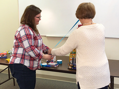 School supply cake finishing touches